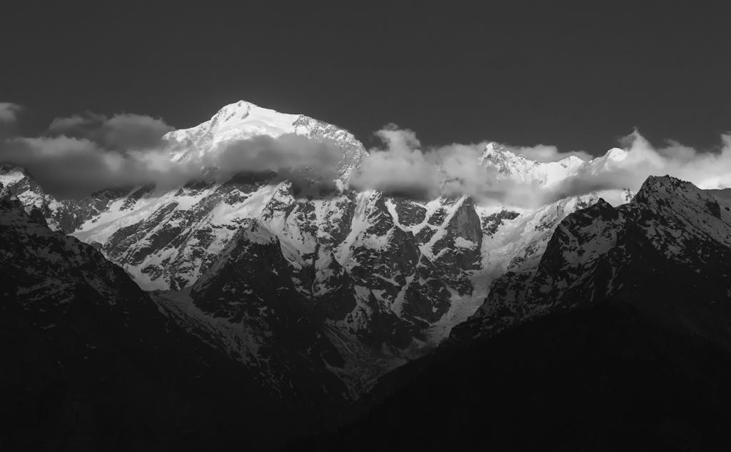 Dramatic black and white photo of snowy Himalayan peaks where shilajit is found