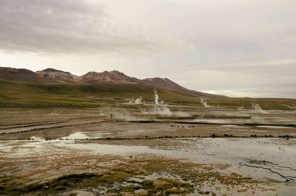 Stunning geothermal fields near San Pedro de Atacama showcasing steam rising in a barren landscape. zeolite comes from volcano minerals