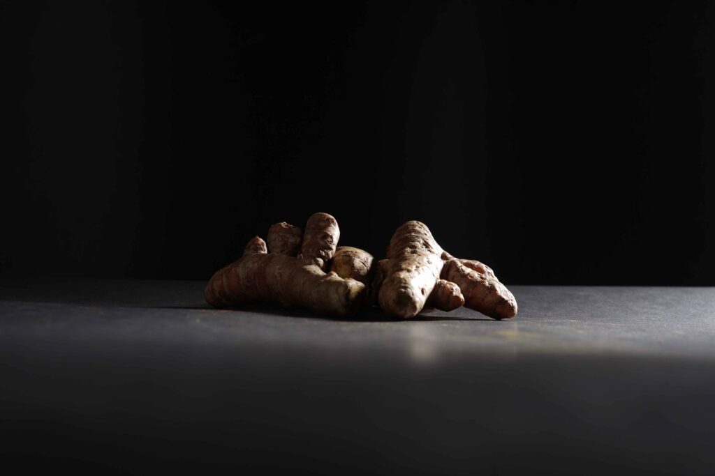 Black ginger on dark table